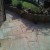This is a picture of a customer's stone slab floor which has been treated and cleaned using Algaecide.  As you can see from the picture the floor has been restored to its orginal state even though this customer laid this floor 7 years ago.  The stone was heavily infested with black mold and built in grime and was sprayed with Algaecide, left for a week for the mold and algae to die off.  Once the mold and algae have died off you can jet away and leave a remarkable finish.